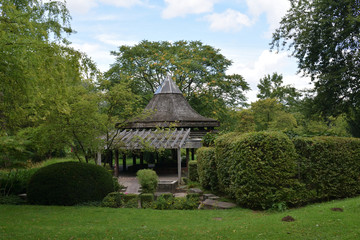 Large Wooden Gazebo with Pointed Roof in Park 6809-042