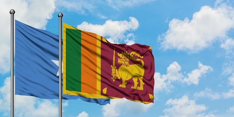Somalia and Sri Lanka flag waving in the wind against white cloudy blue sky together. Diplomacy...