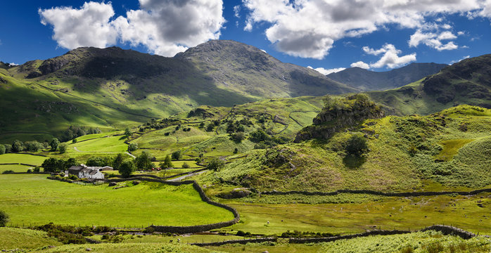 Fell Foot Farm in Little Langdale valley beside Castle Howe rock and Wetherlam Swirl How and Great Carrs peaks Lake District England