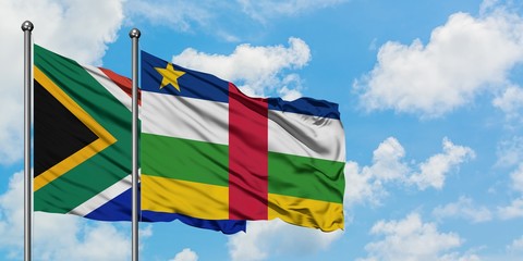 South Africa and Central African Republic flag waving in the wind against white cloudy blue sky together. Diplomacy concept, international relations.