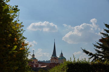 The sharp spire of the church against the sky in Prague, Czech Republic.