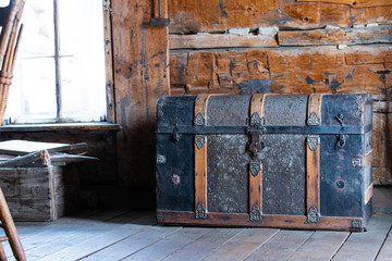 Old retro wooden chest and vintage grunge suitcase