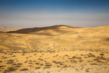 Fototapeta na wymiar King's Highway road accross the desert between Aqaba & Petra, Jordan.