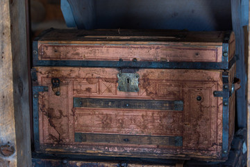 Old retro wooden chest and vintage grunge suitcase