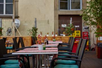 Tables and chairs on the terrace in a cafe in Prague, Czech Republic.