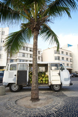 Old van delivering coconuts on the boardwalk in Ipanema Beach, Rio de Janeiro, Brazil