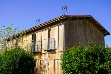 housing estate of modern wooden house in street
