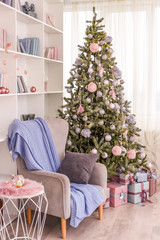Merry Christmas and Happy Holidays! Beautiful living room decorated for Christmas.