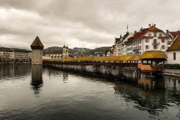 Fototapeta na wymiar Lucerne historic city center view of famous Chapel Bridge and lake Vierwaldstattersee, Canton of Lucerne, Switzerland