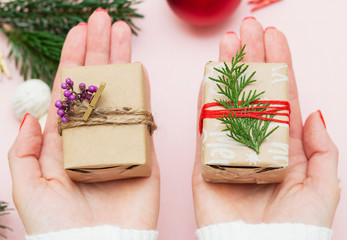 handmade decorations for the holiday, gift wrapping, girl packs a gift