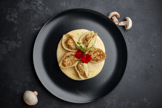 Italian pasta Conkiglioni with meat and mushrooms