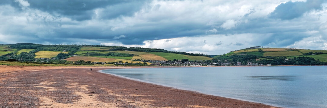 Rosemarkie Bay with people walking the shore