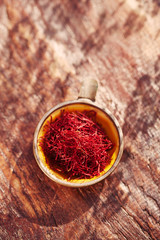 saffron threads  in vintage dishes