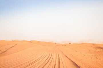 Fototapeta na wymiar Desert sand road