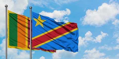 Sri Lanka and Congo flag waving in the wind against white cloudy blue sky together. Diplomacy concept, international relations.