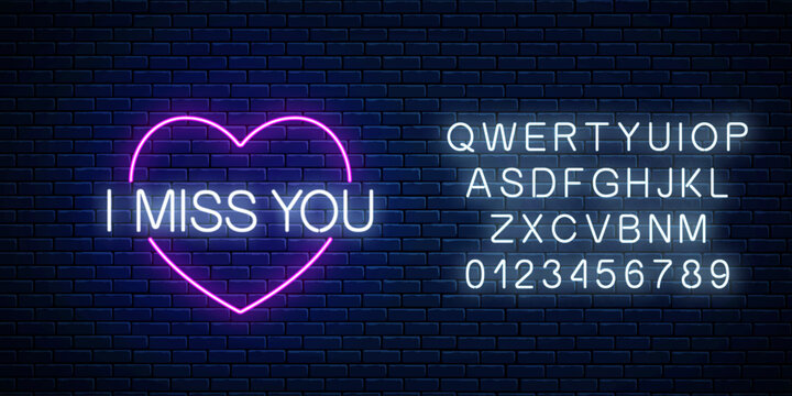 Miss you glowing neon sign with pink heart symbol with alphabet. Symbol of loneliness in neon style.