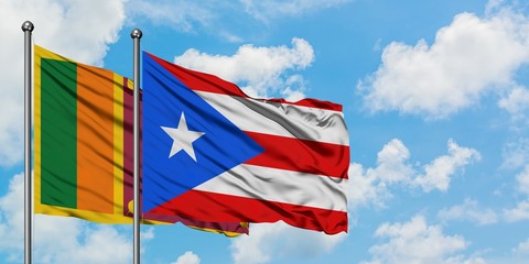 Sri Lanka and Puerto Rico flag waving in the wind against white cloudy blue sky together. Diplomacy concept, international relations.