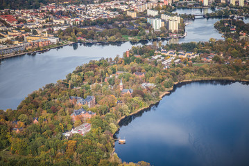 Potsdam, Germany, Peninsula Hermannswerder,  Templin suburb from city of Potsdam, (Templiner Vorstadt) surrounds by river Havel during early autumn  - obrazy, fototapety, plakaty
