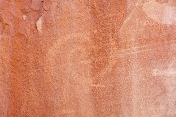 Detail of a part of the petroglyphs incised by the Fremont People in the sandstone rock face at Dinosaur National Monument, Utah