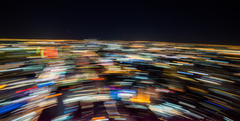 Abstract Background. Light Trails Caused by Skyscraper Rooftop Rotating Platform