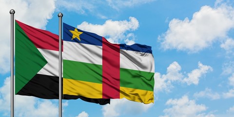 Sudan and Central African Republic flag waving in the wind against white cloudy blue sky together. Diplomacy concept, international relations.