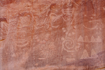 Detail of a part of the petroglyphs incised by the Fremont People in the sandstone rock face at...