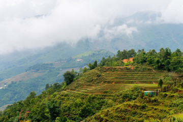 Beautiful shot of Sapa and the surrounding mountains in North Vietnam during a overcast day in Autumn 2019
