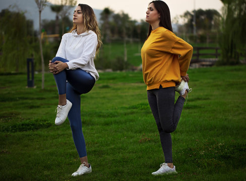 two girls doing sports in the park