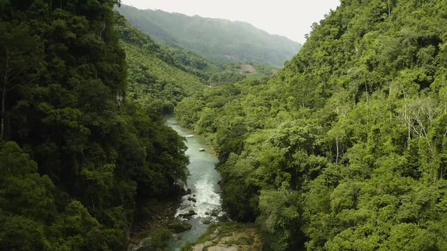 Flying over Semuc Champey during daytime. Dolly shot drone 4k.