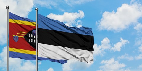 Swaziland and Estonia flag waving in the wind against white cloudy blue sky together. Diplomacy concept, international relations.