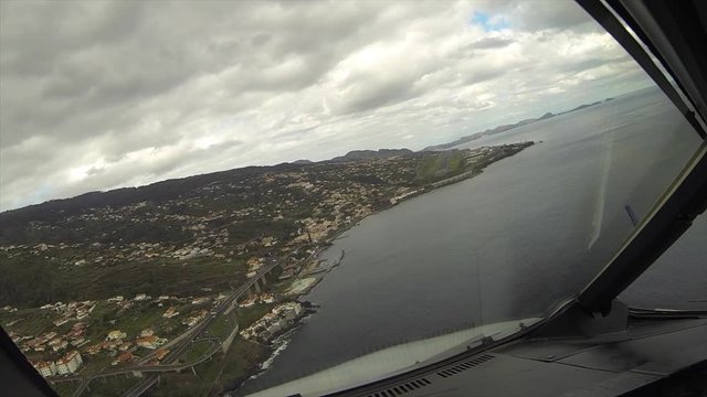 Funchal, Madeira, Portugal,  Pilots view during landing on runway 05 at demanding "Cristiano Ronaldo Madeira International Airport" also known as Funchal Airport