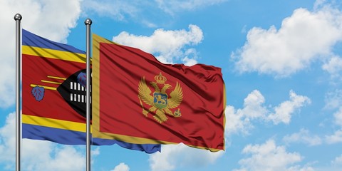 Swaziland and Montenegro flag waving in the wind against white cloudy blue sky together. Diplomacy concept, international relations.