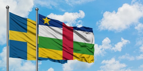 Sweden and Central African Republic flag waving in the wind against white cloudy blue sky together. Diplomacy concept, international relations.