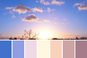Color matching natural swatch palette from panoramic image of sky over Berlin on sunset with cream...