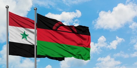 Syria and Malawi flag waving in the wind against white cloudy blue sky together. Diplomacy concept,...