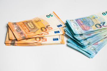 Obraz na płótnie Canvas Euro bill money note pile bundle on white background