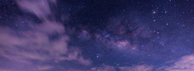 Amazing Panorama blue night sky milky way and star on dark background.Universe filled, nebula and galaxy with noise and grain.Photo by long exposure and select white balance