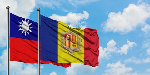 Taiwan and Andorra flag waving in the wind against white cloudy blue sky together. Diplomacy...