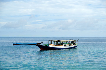 Indonesia Alor - traditional boat lie at anchor