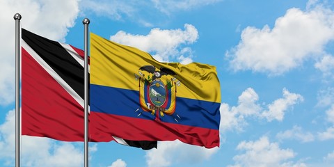Trinidad And Tobago and Ecuador flag waving in the wind against white cloudy blue sky together. Diplomacy concept, international relations.