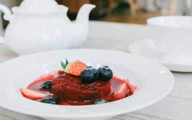 Summer pudding with berries and sauce