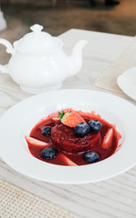 Summer pudding with berries and sauce