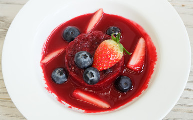 Summer pudding with berries and sauce