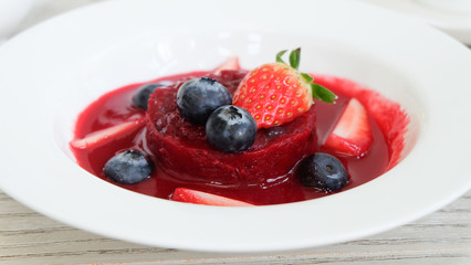 Summer pudding with berries and sauce