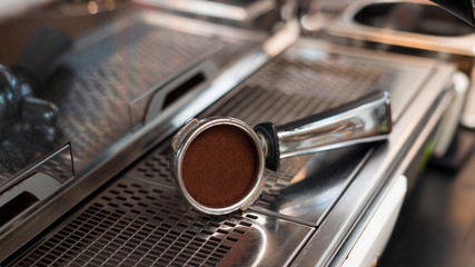 Coffee powder on coffee tamper