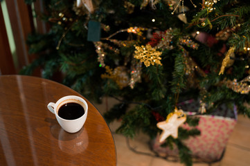 black coffee put on table with christmas theme background