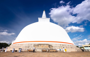 Budhism at Ruwanweliseya are praying, meditate. Anuradhapura, Sri Lanka. .