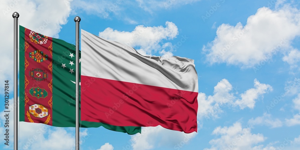 Wall mural Turkmenistan and Poland flag waving in the wind against white cloudy blue sky together. Diplomacy concept, international relations. - Wall murals
