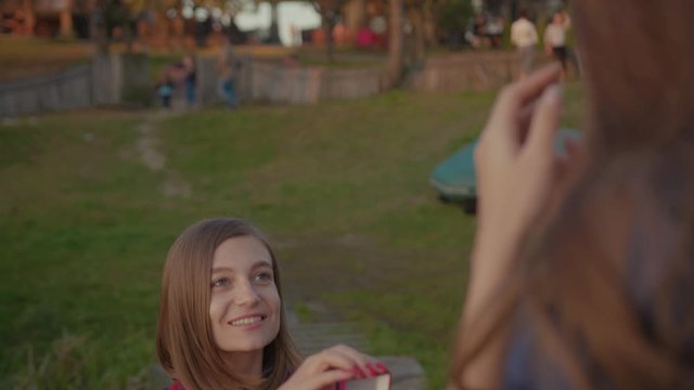 Cheerful young woman making exciting marriage proposal to her girlfriend enjoying amazing memorable event hugging kissing together. Declaration of love.