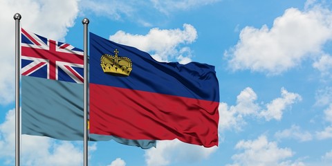 Tuvalu and Liechtenstein flag waving in the wind against white cloudy blue sky together. Diplomacy concept, international relations.